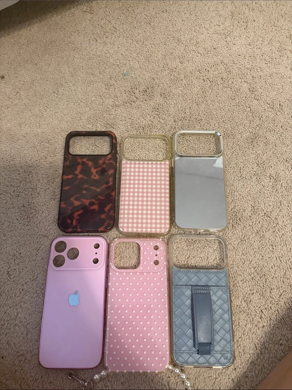 Apple Pink iPhone with Pink, Blue, Brown and Silver Case Set